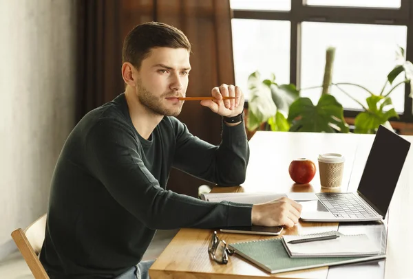 Man Thinking On Business Startup Sitting At Laptop In Office — Φωτογραφία Αρχείου