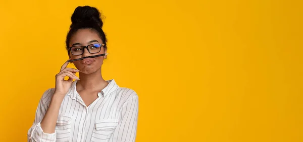 Portrait Of Pensive Afro Woman With Pencil As Mustache Looking Aside — Stock Photo, Image