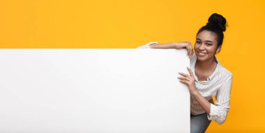 Black Girl Holding White Advertisement Board With Free Space For Text