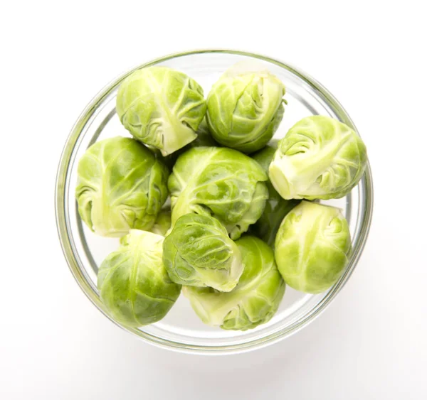 Vegetables for everyone. Brussels sprouts in glass bowl — Stock fotografie