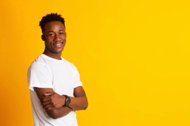Happy and delighted handsome young african man