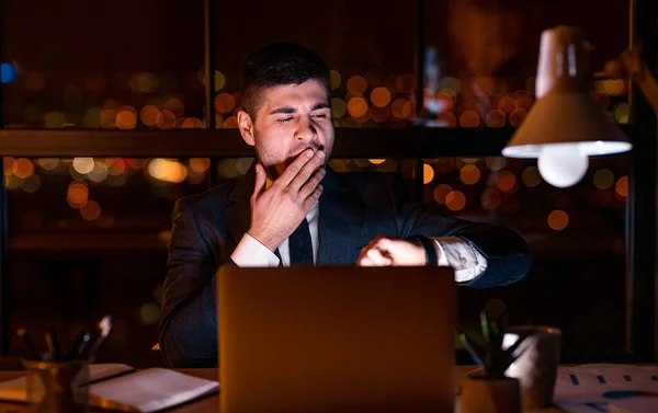 Businessman Yawning Checking Time Working Late At Night In Office — Φωτογραφία Αρχείου