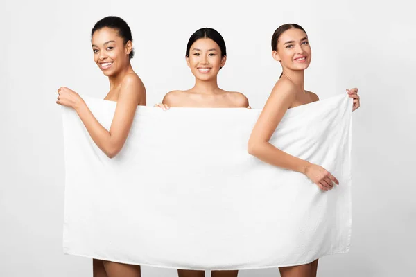 Three Women Posing Covering Bodies With Bath Towel, White Background — Stock Photo, Image