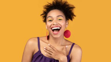 Portrait of cute black girl laughing out loud