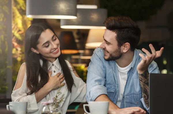 Attractive Girl Flirting With Freelancer Guy Working In Cafe — Stockfoto