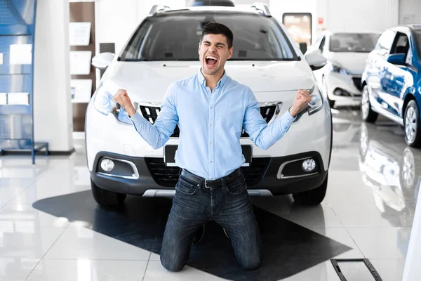 Excited Man Shouting Shaking Fists Buying New Car — Stock Fotó