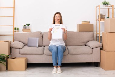 Woman giving five star for cleaning company for cleaning after repair