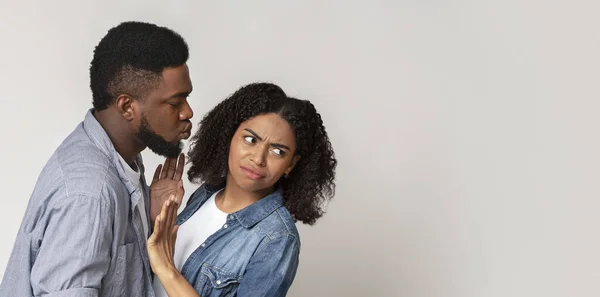 Coronavirus Precautions. Disgusted Black Woman Pushing Away Boyfriend, Refusing His Kisses — Stock Photo, Image