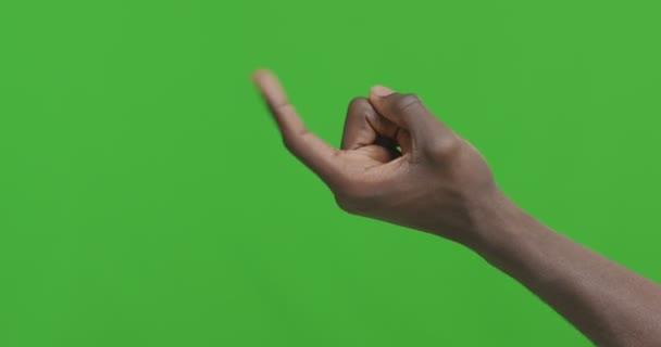Black male hand asking to follow him, green chroma key background — Stock Video