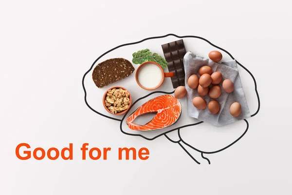 Productos para aumentar su memoria. Alimentos saludables y contorno de cerebros sobre fondo blanco, diseño creativo — Foto de Stock