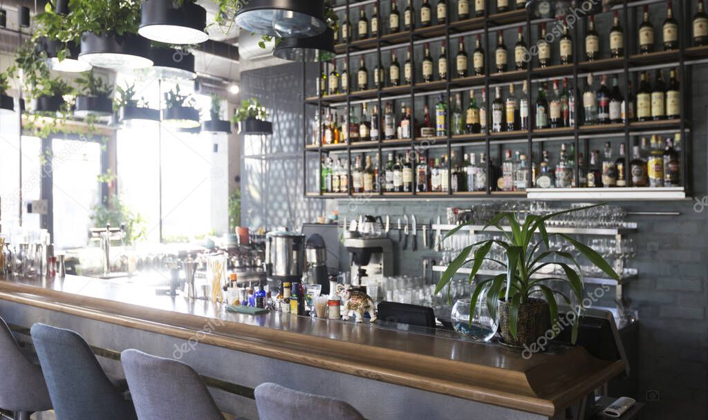 Interior of a modern urban restaurant with bar counter