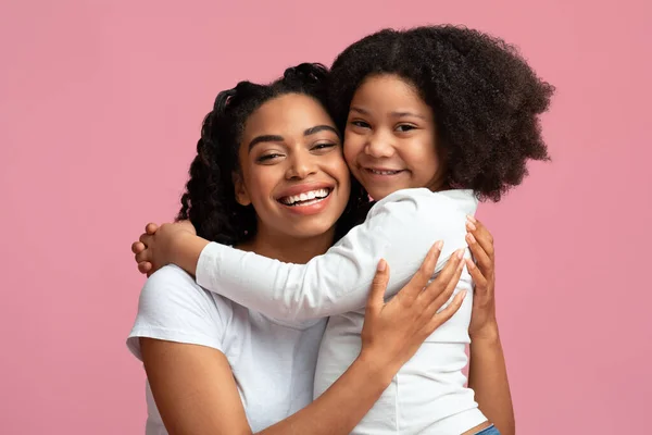 Mommys Girl. Smiling Black Woman Embracing Her Cute Little Daughter — Stock Photo, Image