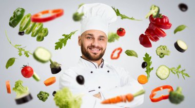 Sağlıklı yemek planı. Usta şef ve gri arka planda yüzen sebzeler, yaratıcı kolaj