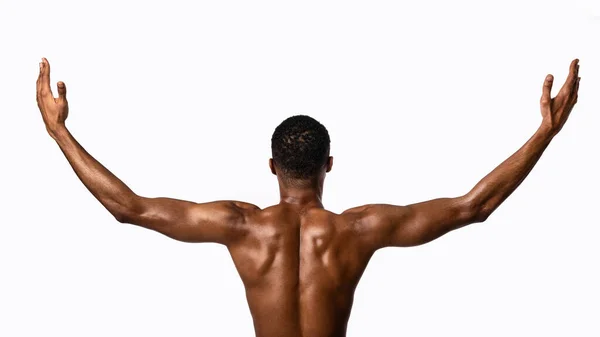 Muscular Man Posing Raising Hands Standing On White Background, Rear-View — Stock Photo, Image