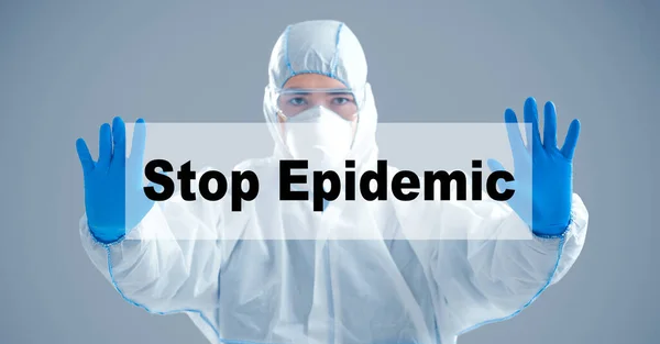 Aziatische man in een hazmat pak met inscriptie stop epidemie — Stockfoto