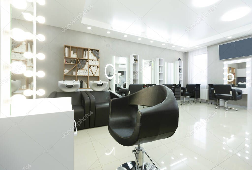 Barber chair and backlit mirror in bright Interior