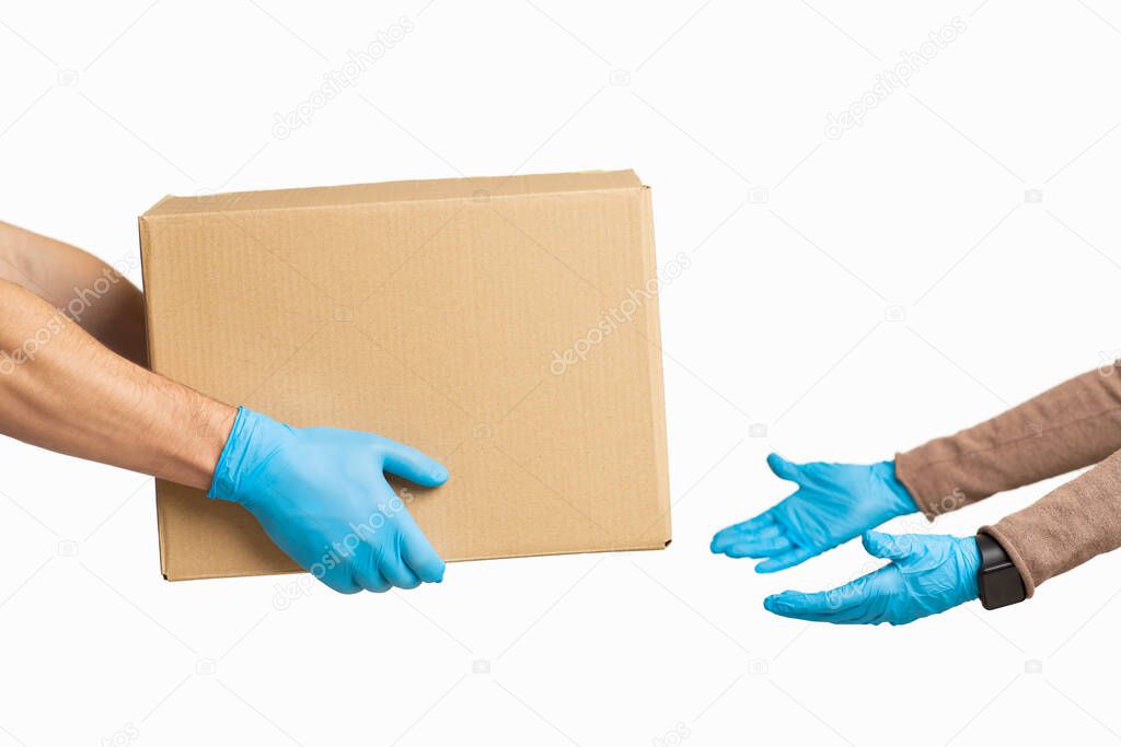 Transfer of cardboard parcels during quarantine, cropped