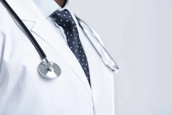 Doctor in white robe with stethoscope on his chest — Stock Photo, Image