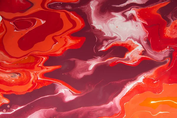 Red Liquid marble pattern, vibrant colors, creative ink — Stockfoto