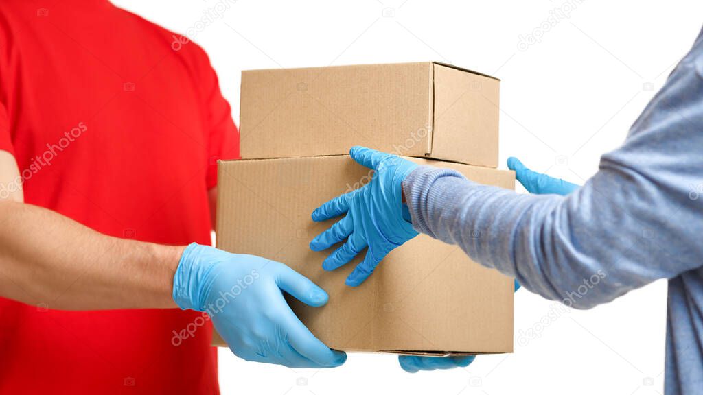 Fast home delivery. Courier gives parcels isolated on white background