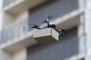 New drone with package box, delivery service clipart