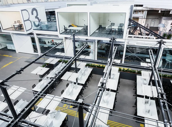 Top view of empty IT office, covered computers, no workers — Stock Photo, Image