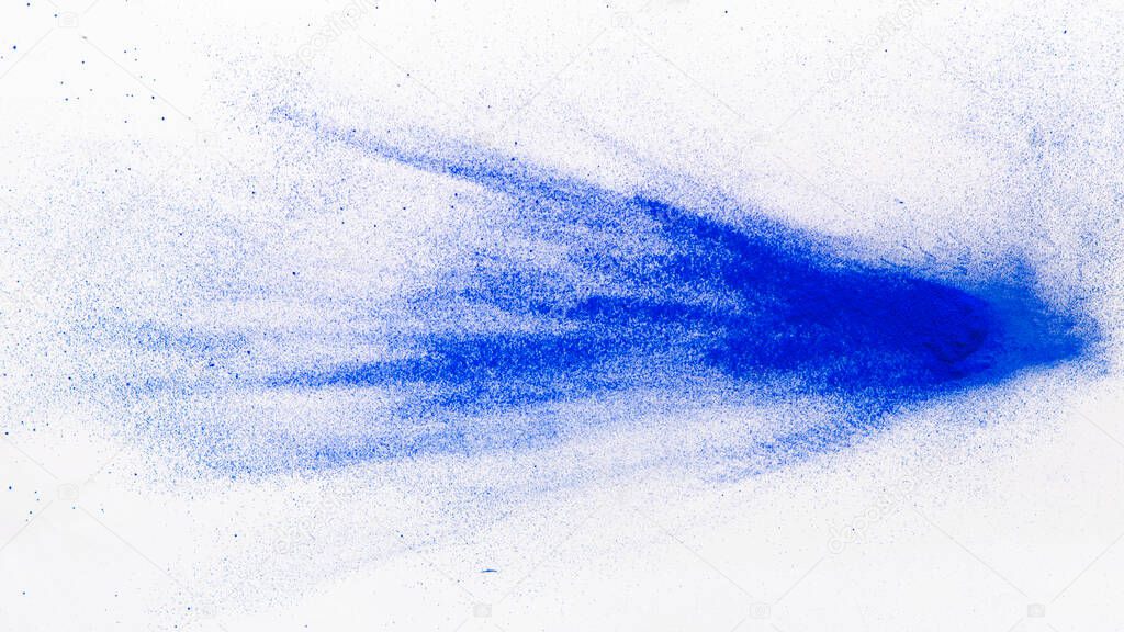 Explosion of blue food coloring on white background