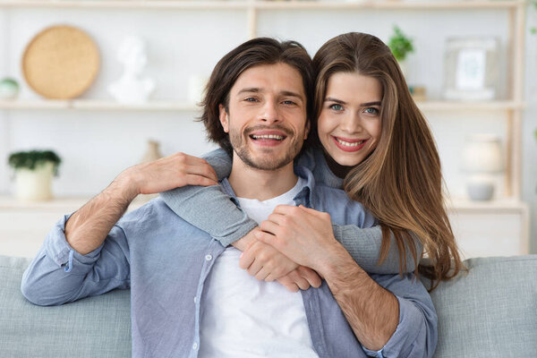 Close up portrait of happily married young couple
