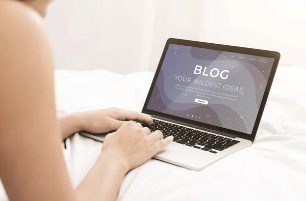 Unrecognizable female blogger working with laptop in her comfy bed, collage — Stock Photo, Image