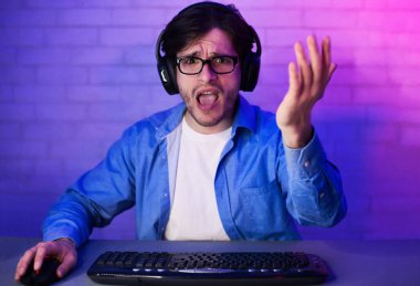 Angry Gamer Losing Game Playing Online On Computer At Home