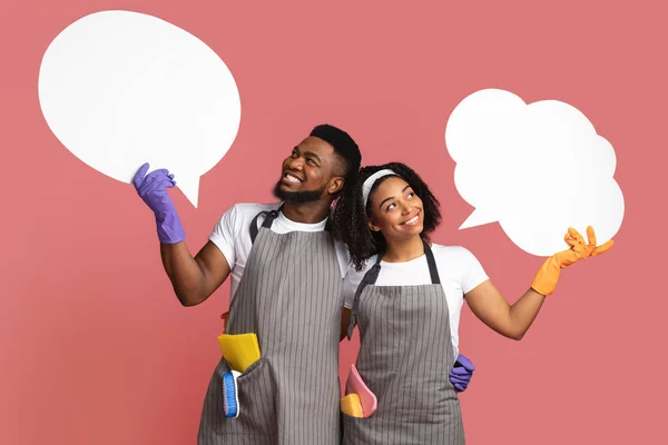 Joyful Couple Of Cleaners Looking At Empty Speech Bubbles Above Their Heads — Stock Photo, Image