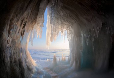Ice grottoes on the shore of Lake Baikal clipart
