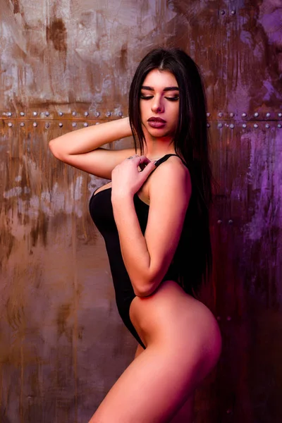 Mulher sexy em bodysuit — Fotografia de Stock