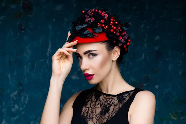 Woman in elegant headdress — Stock Photo, Image