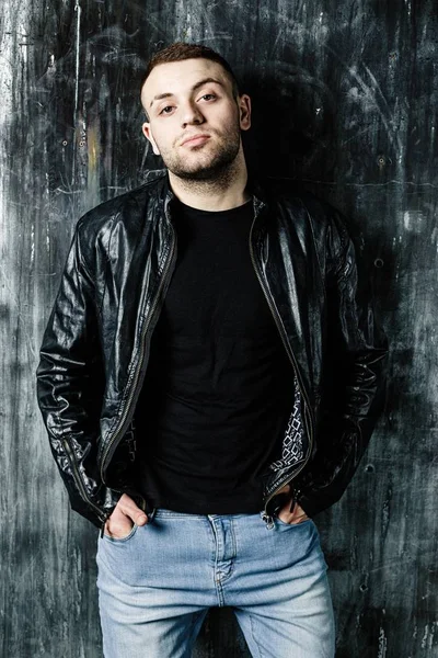 Confident man in leather jacket — Stock Photo, Image