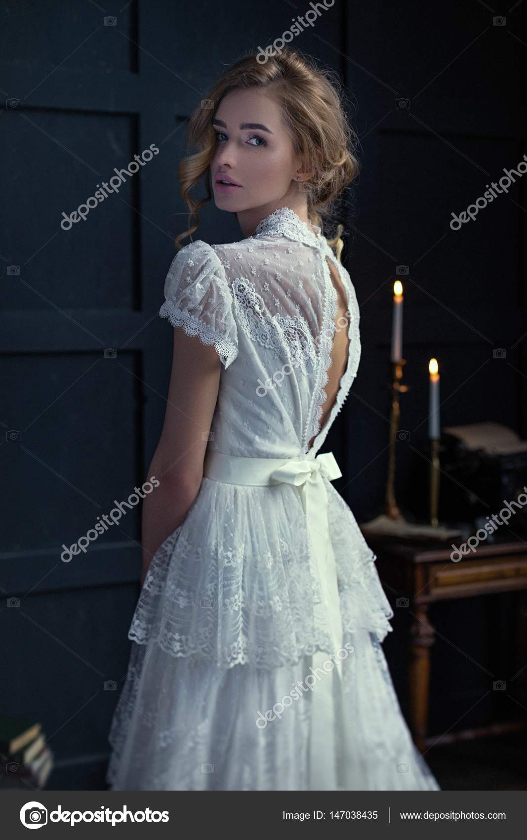 Woman in old-fashioned dress Stock Photo by ©smmartynenko 147038435
