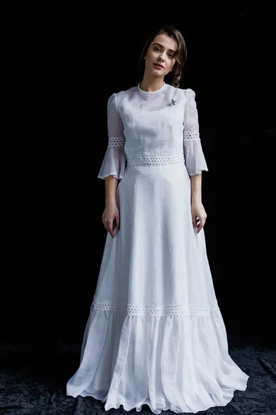 Woman in vintage wedding dress