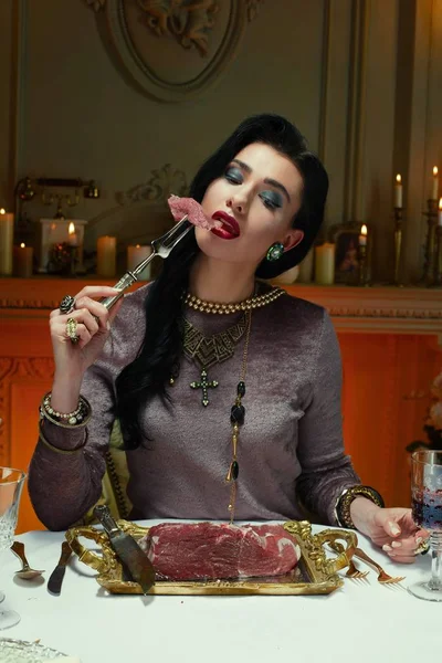 woman eating raw meat