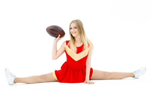 Cheerleader holding ball — Stock Photo, Image