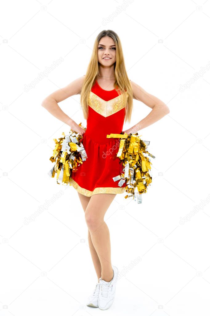 Cheerleader posing with pom-poms