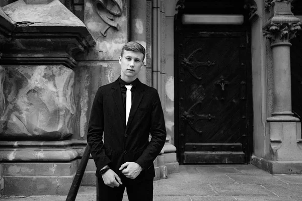 Handsome man in black suit — Stock Photo, Image