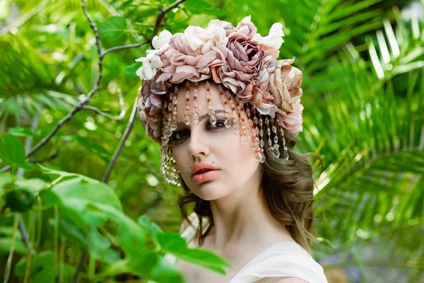 Woman in elegant headwear — Stock Photo, Image