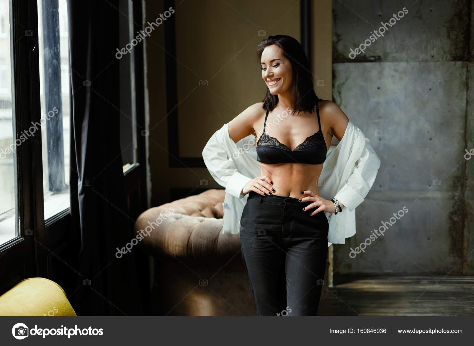 Woman in black bra and white shirt Stock Photo by ©smmartynenko 160846036