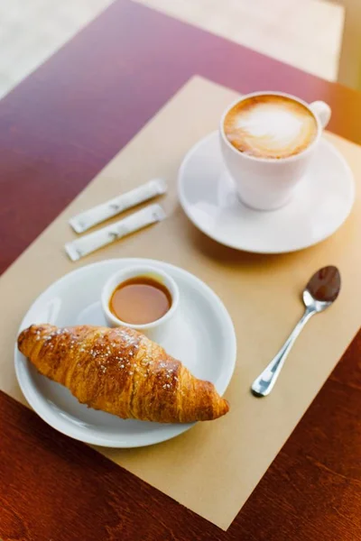 French croissant and and coffee — Stock Photo, Image