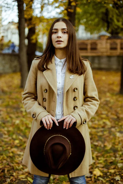 Attractive Young Woman Holding Fashionable Hat White Posing Autumnal Park — Stock Photo, Image