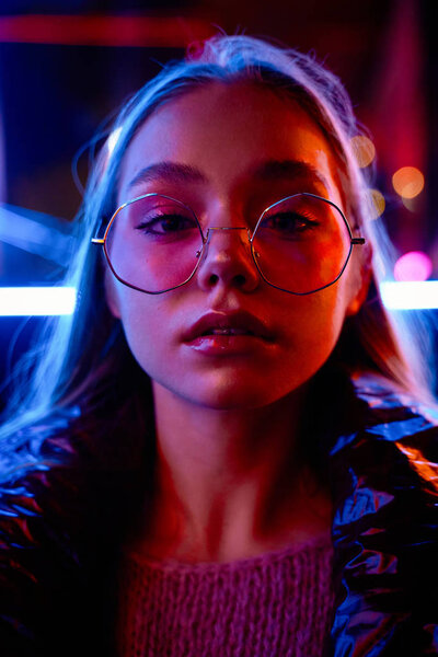 fashion portrait of gorgeous young woman in fashionable eyeglasses  