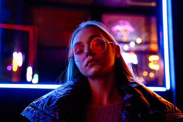 fashion portrait of gorgeous young woman in fashionable eyeglasses  