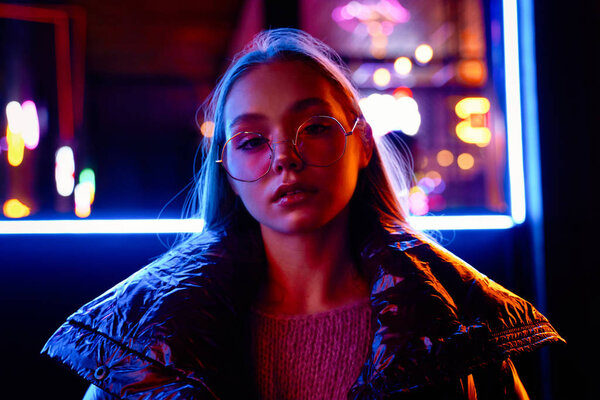 fashion portrait of gorgeous young woman in fashionable eyeglasses  