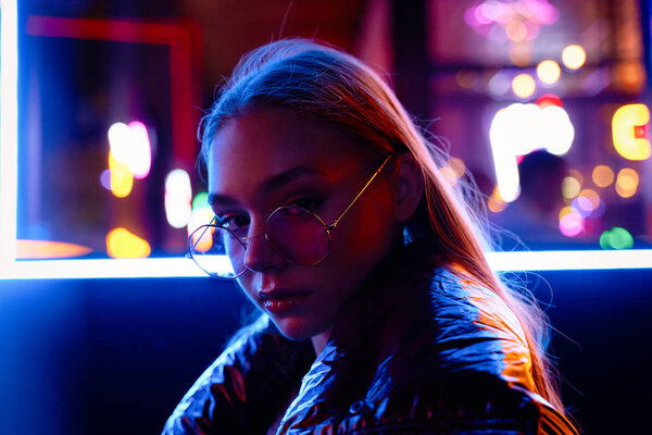 fashion portrait of gorgeous young woman in fashionable eyeglasses  