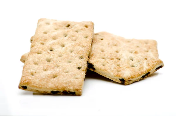 Stack van cookies, koekjes met rozijnen op witte achtergrond — Stockfoto